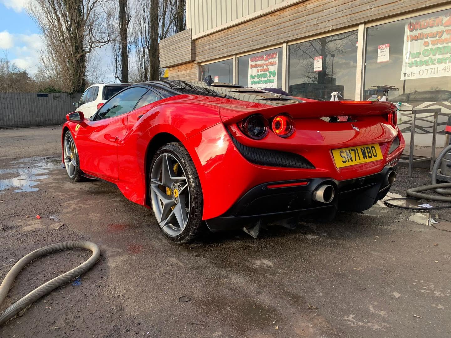 Red Ferrari outside Bubbleboyz Hinckley